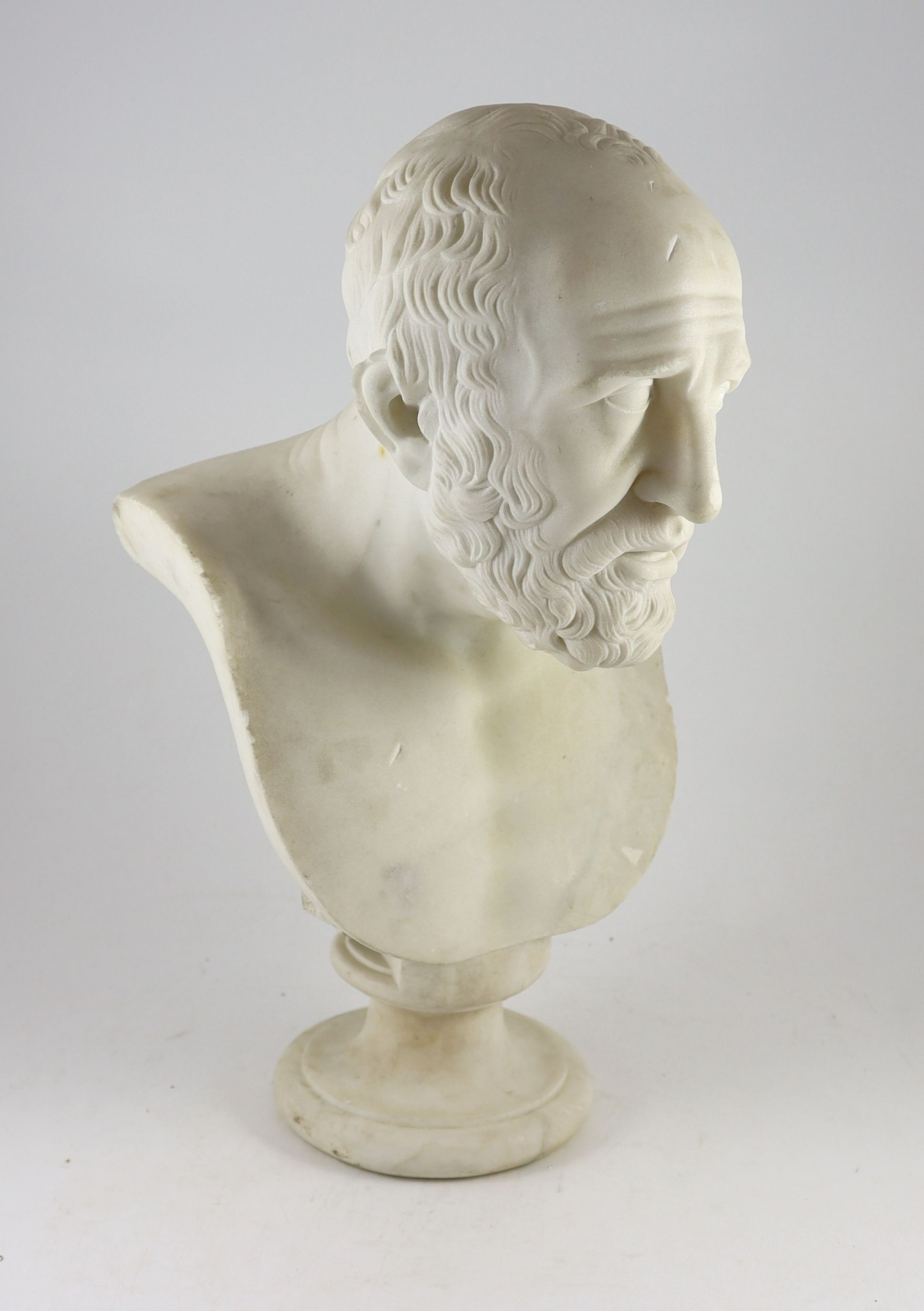 A 19th century Italian carved white marble bust of a bearded man, width 31cm, height 56cm